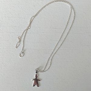 Silver necklace with "child" pendant